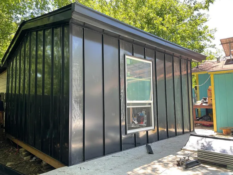 Black standing seam metal wall panels for Metal Roof Installation in Cazenovia