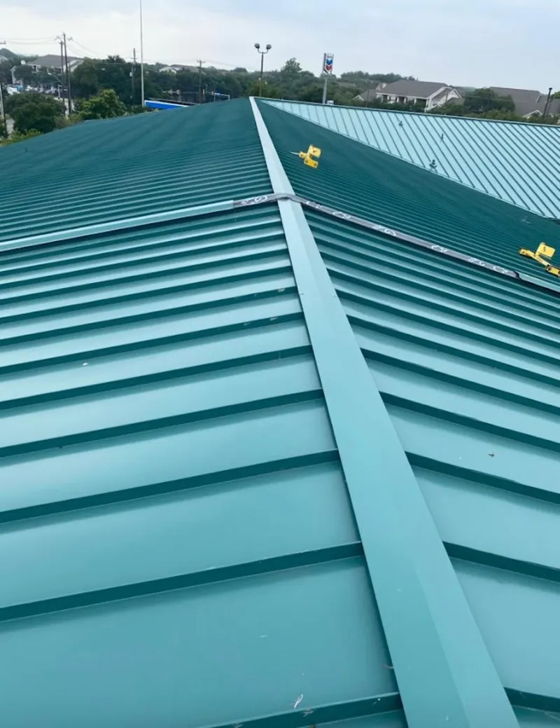 Green commercial metal roof ridge and valley for Metal Roof Repair in Cazenovia