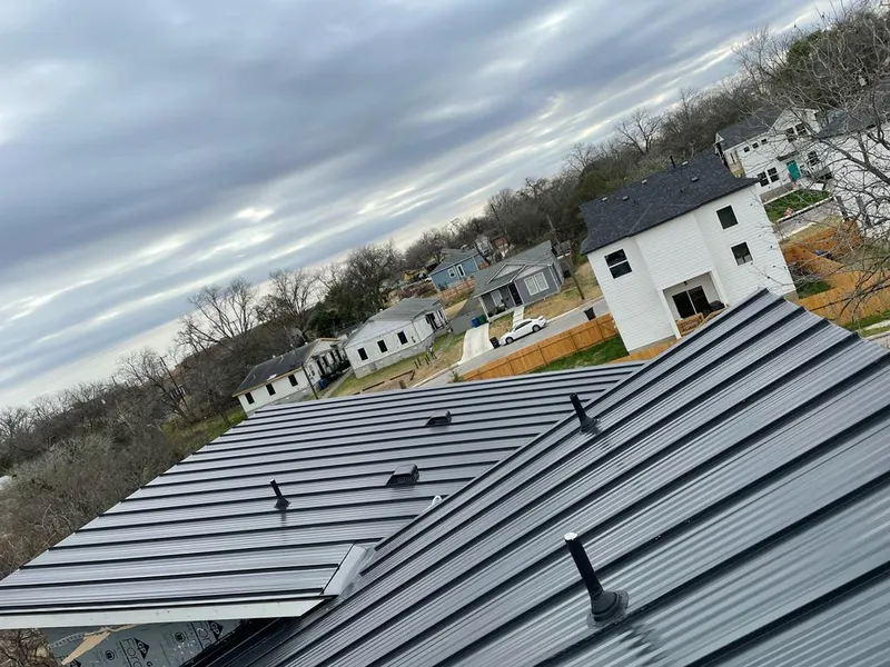 Standing seam metal roof panels with vents for Skylight Repair in Cazenovia